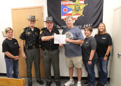 Makala Hamilton; Chief Deputy Erick Hoskinson; Sheriff William R. Barker; Doug Clifford; Amanda Danison; and Sandy Leckrone. (not pictured Lt. Brandon Forester)