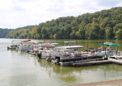 Burr Oak Lake is a popular destination for pontoon boat owners. Seasonal rental slips like these at Dock 4 are available at Burr Oak.