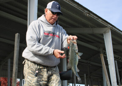 My best bass of the second trip to Mystery Lake was a fat 3.54 pound largemouth bass that hit a green pumpkin brown Texas rigged Will Boss. Photo credit belongs to Mary Kayser.