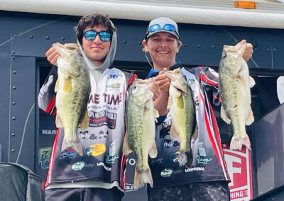 Hoyt Nicely (dark curly hair) and Connor Bower (in the hat) took first place in the Major League Fishing High School Team Tournament at Lake Guntersville in Alabama.