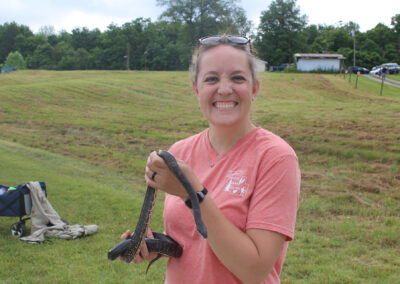Woman holding a snake