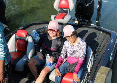 Mary Kayser and Pat Davis are enjoying a laugh at the expense of Bob and Doug.